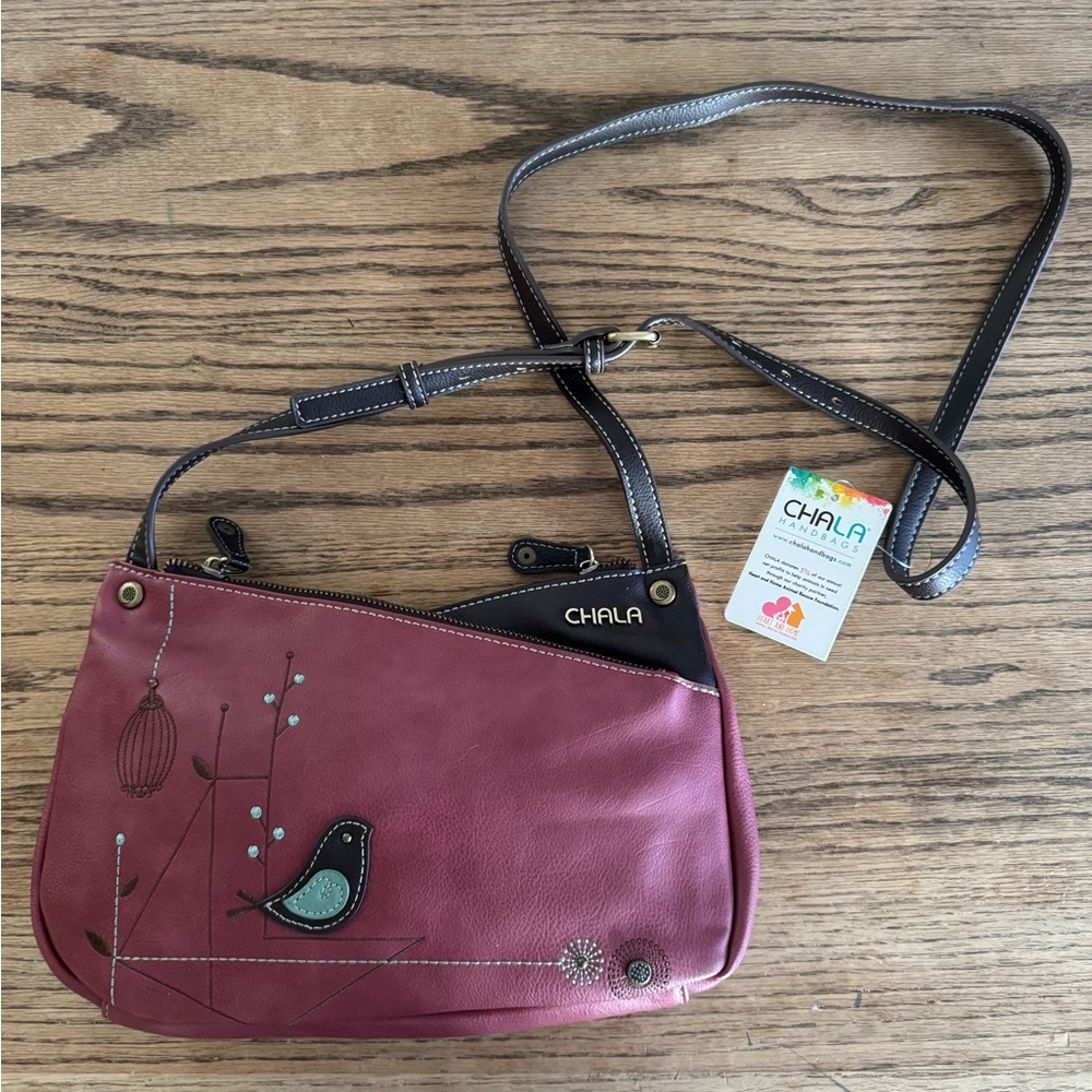 NWT Crossbody faux leather bag with bird design adjustable strap & multi pockets